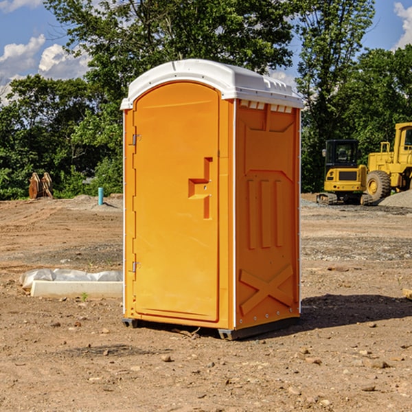 how often are the portable restrooms cleaned and serviced during a rental period in Ashville